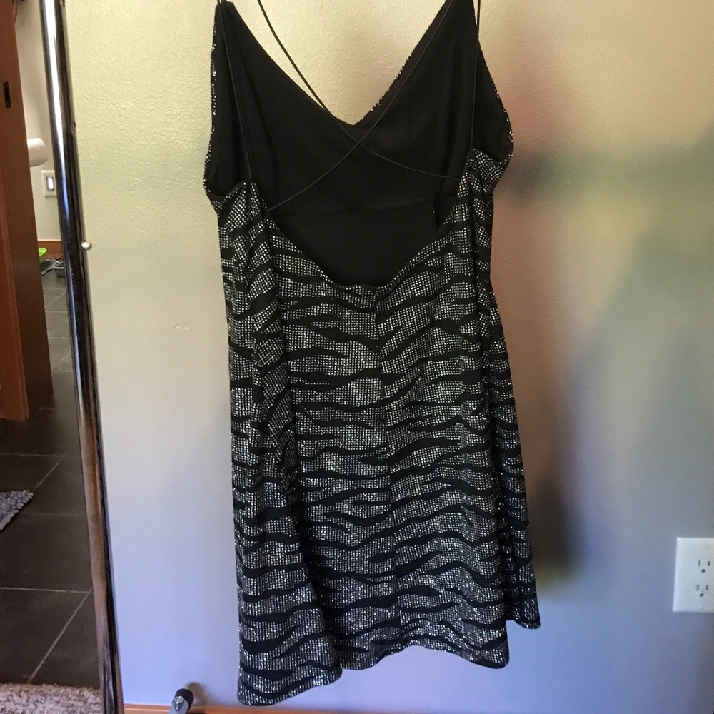Black dress with sparkly zebra print pattern
